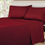 Egyptian Cotton 530 Thread Count Solid Deep Pocket Bed Sheet Set – A neatly spread bed showcasing luxurious, smooth sheets in a rich, solid color